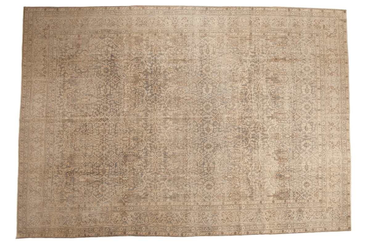 Distressed Vintage Oushak carpet with intricate all-over design in ivory and dark silver.