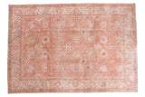 Vintage distressed Oushak carpet with faded crevette pink, ivory, seaglass blue floral design.