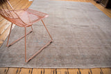 Faded texture and soft blue patterns of the hand-knotted vintage Sivas carpet.