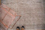Vintage Sivas carpet with even distressed texture showing ivory, platinum, and light blue.
