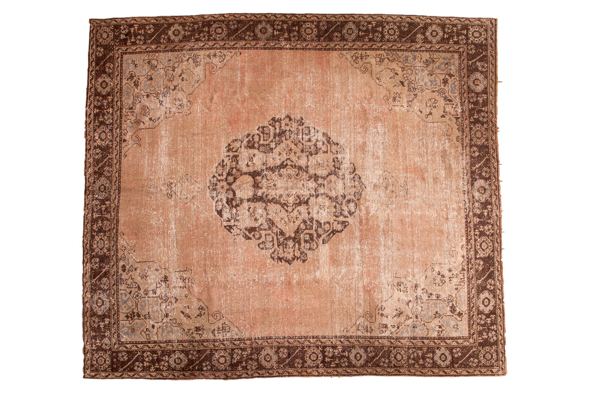 Distressed vintage Oushak carpet, salmon field, brown medallion, slate silver details, 9'10" x 11'3".