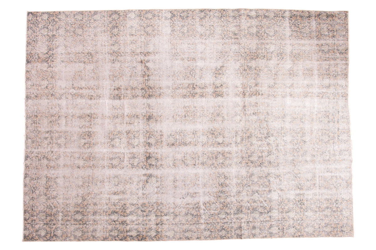 Distressed Vintage Oushak carpet, subtle rococo design in ivory, gold, faded green.