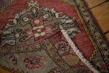 Hand-knotted back and secure edge of Vintage Oushak rug with Cinnabar red pile.