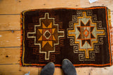 Vintage Oushak rug: tribal geometric medallion, tangerine, saffron, brown, orange fringe.