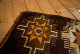 Vintage hand knotted Oushak mat, tribal geometric pattern in tangerine, saffron, and orange fringe.