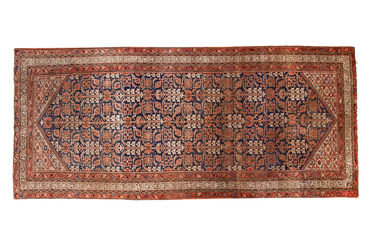 Vintage Malayer runner, dark indigo field, allover henna plant design, terra cotta and antique ivory, aged patina.