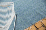 Abrashed denim blue and green woven texture of the vintage Turkish throw.