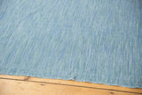 Vintage Turkish throw cloth with abrashed denim texture, blue-green striations, and raw edge.