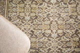 Distressed Hamadan rug, Herati pattern, muted green, charcoal, and ivory with even pile wear.