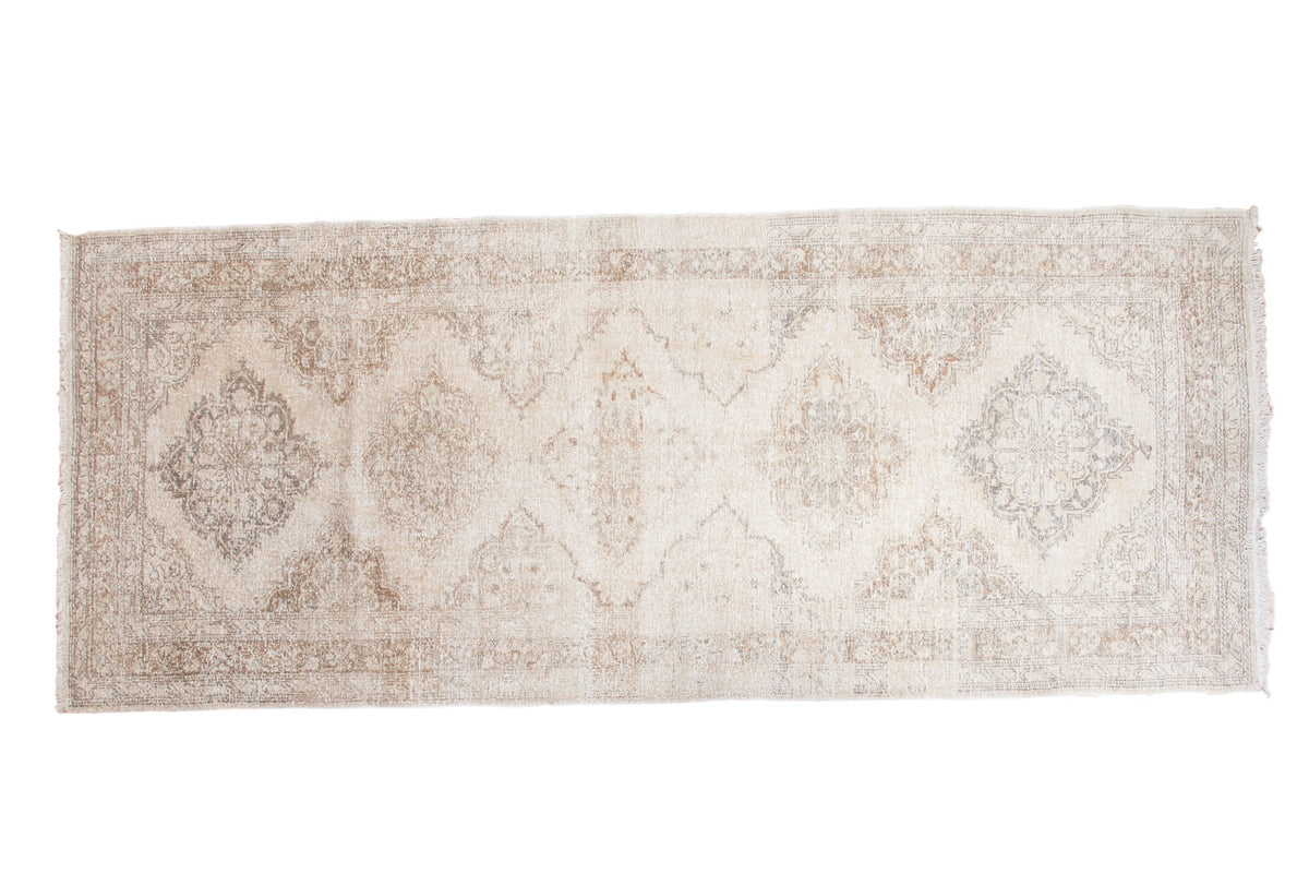 Distressed vintage Turkish Sparta runner, soft ivory, beige, and pewter lattice medallions, 5' x 12'2".