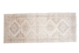 Distressed vintage Turkish Sparta runner, soft ivory, beige, and pewter lattice medallions, 5' x 12'2