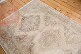 Even distress across the vintage Sparta runner's pile, showing soft ivory and bronze hues.
