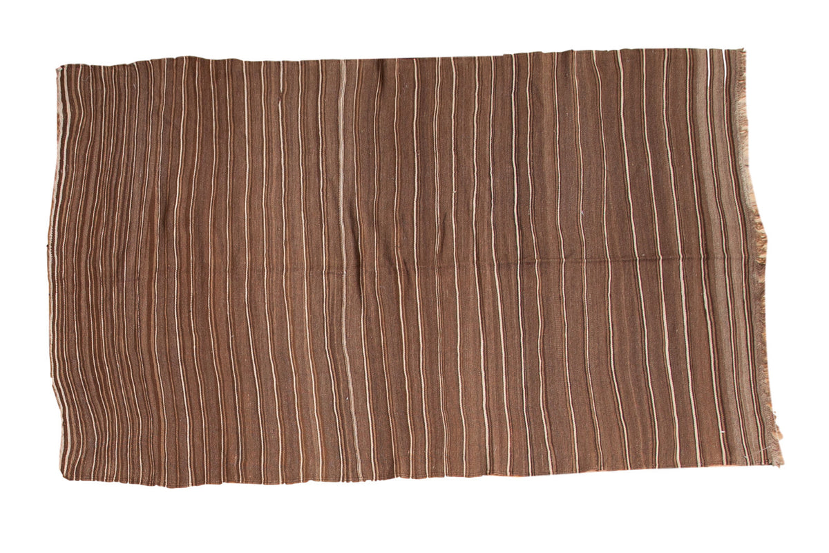 Hand woven vintage Moroccan Kilim rug with natural brown and beige striated weaving.