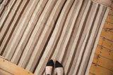 Vintage Moroccan Kilim rug with striated natural beige and brown flat weave texture.