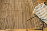 Vintage Striped Moroccan Kilim rug showing striated natural beige and brown weave with small mend.