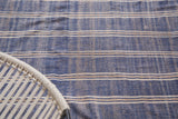 Textured vintage Moroccan Kilim with denim blue, ivory, and beige stripes and subtle sheen.