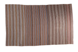Hand woven vintage Moroccan Kilim rug with striated natural beige, coffee, and brown stripes.