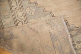 Hand-knotted foundation of the vintage Oushak runner with secured side and muted tones.