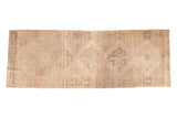 Vintage Turkish Sparta runner with repeating scalloped medallions in muted beige and faded charcoal patterns, 5x13'9