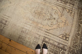 Geometric patterns, heavy abrash, and evenly worn pile on a vintage Turkish Oushak rug.