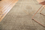 Vintage Oushak runner with geometric border, even pile texture, and sand-charcoal abrashes.