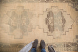 Hand-knotted vintage Oushak runner, primitive geometric medallion in ivory, seafoam green, charcoal.