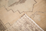 Hand-knotted foundation and geometric pattern on the reverse of the Oushak runner.