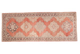 Vintage Turkish Sparta runner with cinnabar red field and blossoming floral medallions, 5'1