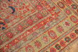 Distressed Malayer runner detail: worn multi-color Herati motifs, visible foundation, and fringe.