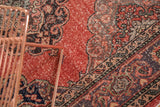 Vintage Sparta runner's distressed cinnabar field with ornate charcoal and green border.