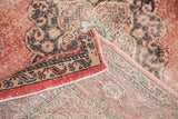 Distressed cinnabar red pile reveals visible foundation and woven back of Sparta runner.
