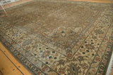Romanian rug corner detail with palmettes, cloud bands, and faded floral motifs.