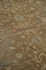 Faded bronze, ivory, and blush delicate floral and scrolling vinery.