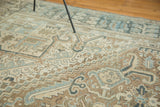 Distressed Karaja carpet close-up, showcasing sand, ivory, and blanched blue Herati-style patterns.