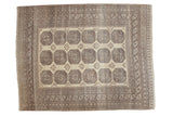 Distressed Afghan carpet featuring gul design, antique ivory, platinum, charcoal abrashes, 9'11
