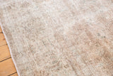 Textural detail of the distressed Sivas carpet, highlighting flat weave and short pile.