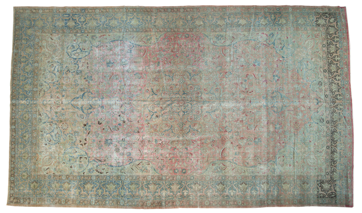 Vintage Distressed Persian Tabriz carpet, blush, teal, ivory floral medallion and vinery.