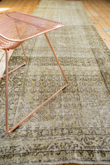 Distressed ivory and pale sage gold boteh pattern with abrashes on antique Malayer runner.