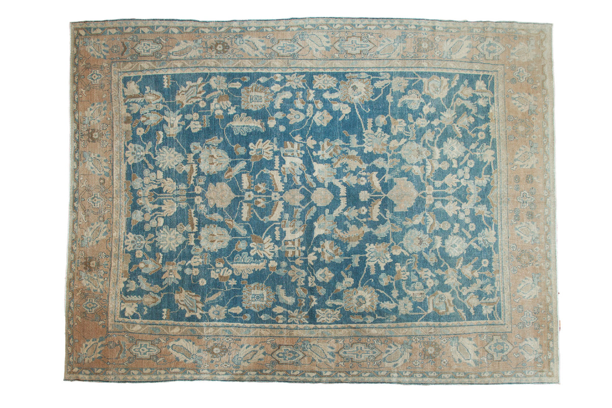 Antique Persian Lilihan carpet, sky blue allover floral design, pale apricot borders.