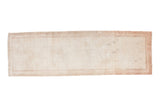 Distressed vintage Oushak rug runner with subtle hexagonal motif in beige, ivory, and blush tones, 3'8
