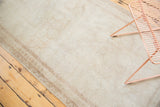 Soft, distressed pile and subtle tone-on-tone hexagonal motifs on a vintage Oushak runner.