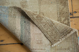 Hand knotted Oushak rug foundation with striped weave and secured side edge.