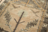 Vintage Oushak rug runner serrated leaf motifs in pale peach, charcoal, and turquoise hues.
