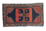 Vintage Turkish Oushak rug runner with bold rectilinear navy, tangerine, and red patterns.