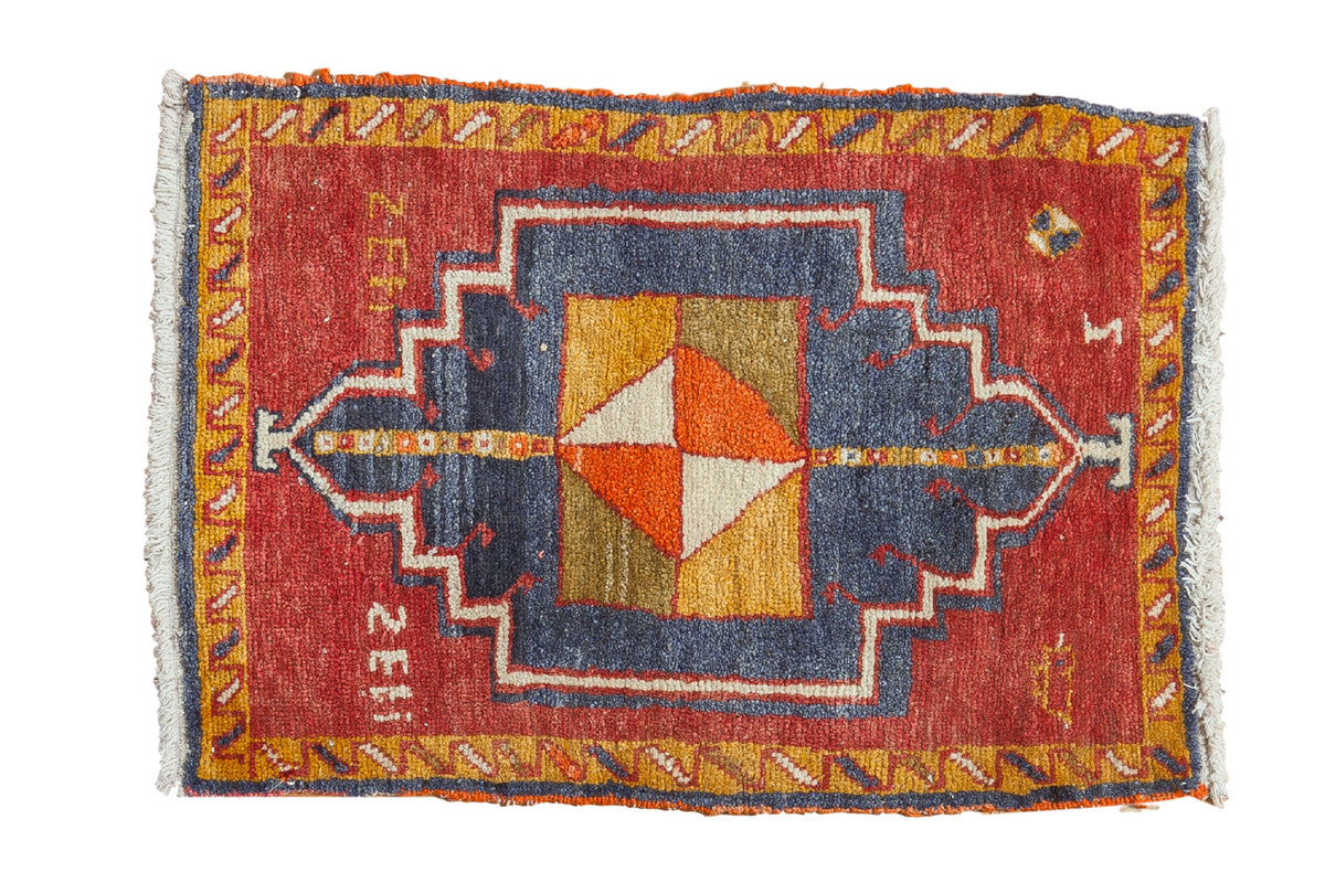 Vintage Oushak square rug, navy geometric medallion with diamond center on madder red, 1'10" x 2'7".