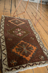 Thick pile vintage Oushak rug, plum brown field, diamond medallion in tangerine, blush rose.