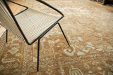 Traditional Karaja carpet section highlighting serrated leaves and geometric motifs in pale bronze, sand, ivory.