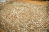 Antique Karaja carpet detail showing geometric Heriz-style patterns, serrated leaves, and even wear.