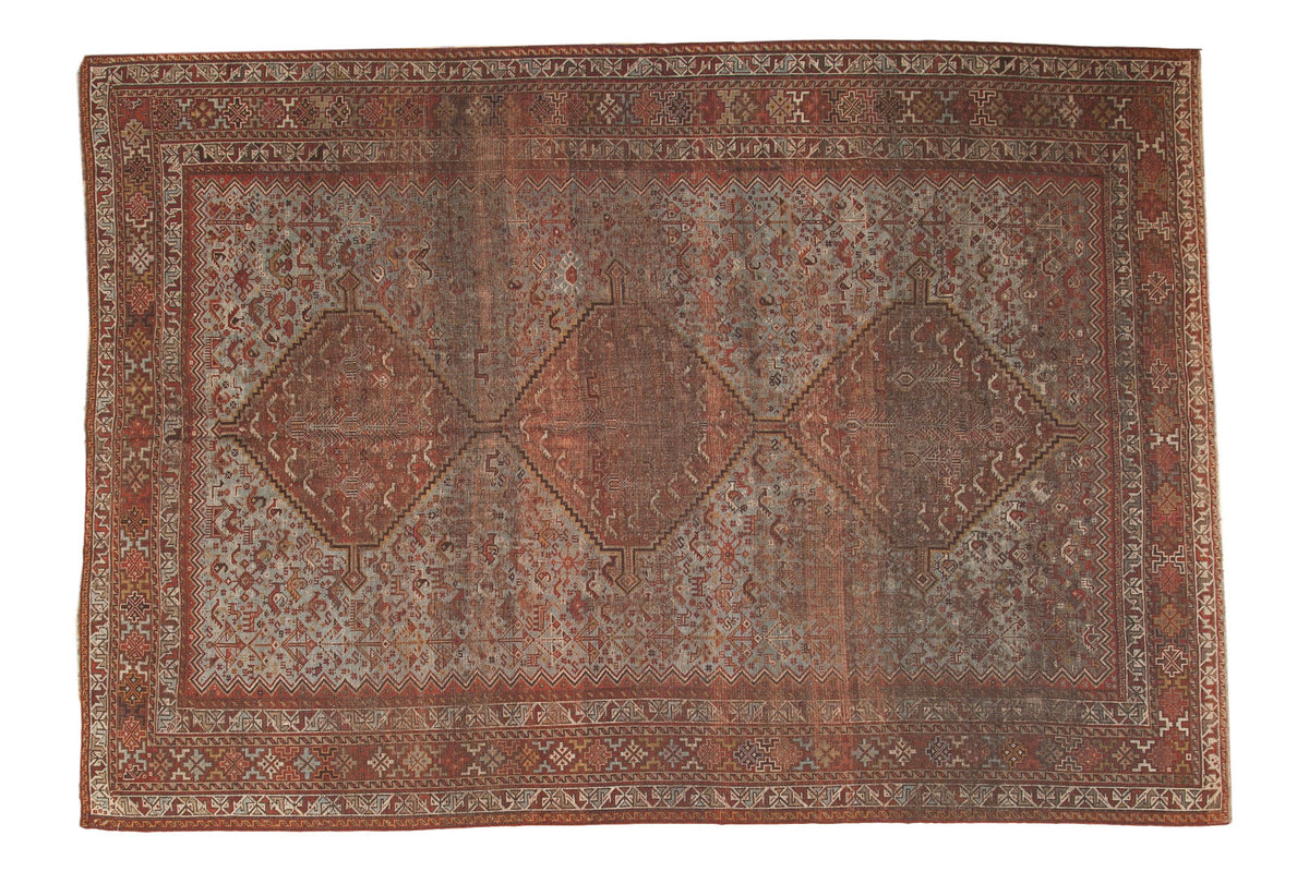 Vintage hand-knotted Shiraz carpet, triple medallions, pale blue field, 6'10" x 9'9".