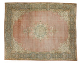 Distressed Kerman carpet with ornate trefoil medallion, blossoming florals, blush, navy, ivory, 12'9